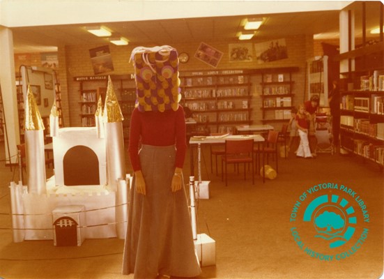 PH00039-37 Library displays - Escape with a Book - Castle and staff member dressed up for occasion - Victoria Park Carlisle Library (Mint Street) Image